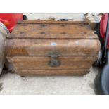 A VINTAGE METAL TRAVEL TRUNK