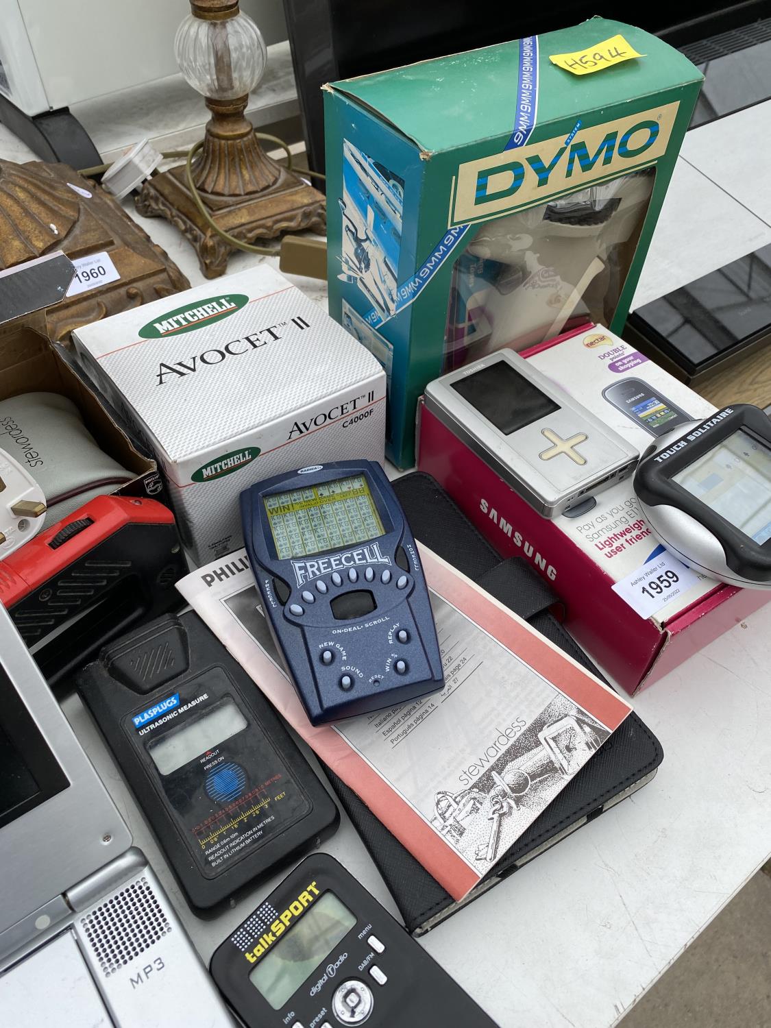 AN ASSORTMENT OF ITEMS TO INCLUDE A PORTABLE DVD PLAYER, RADIOS AND GAMES ETC - Image 2 of 6