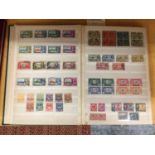 A SELECTION OF COMMONWEALTH AND GEORGE V & VI STAMPS IN AN ALBUM