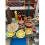 AN ASSORTMENT OF CERAMIC ITEMS TO INCLUDE TUREENS, SPICE CADDIES AND SODA SYPHONS ETC