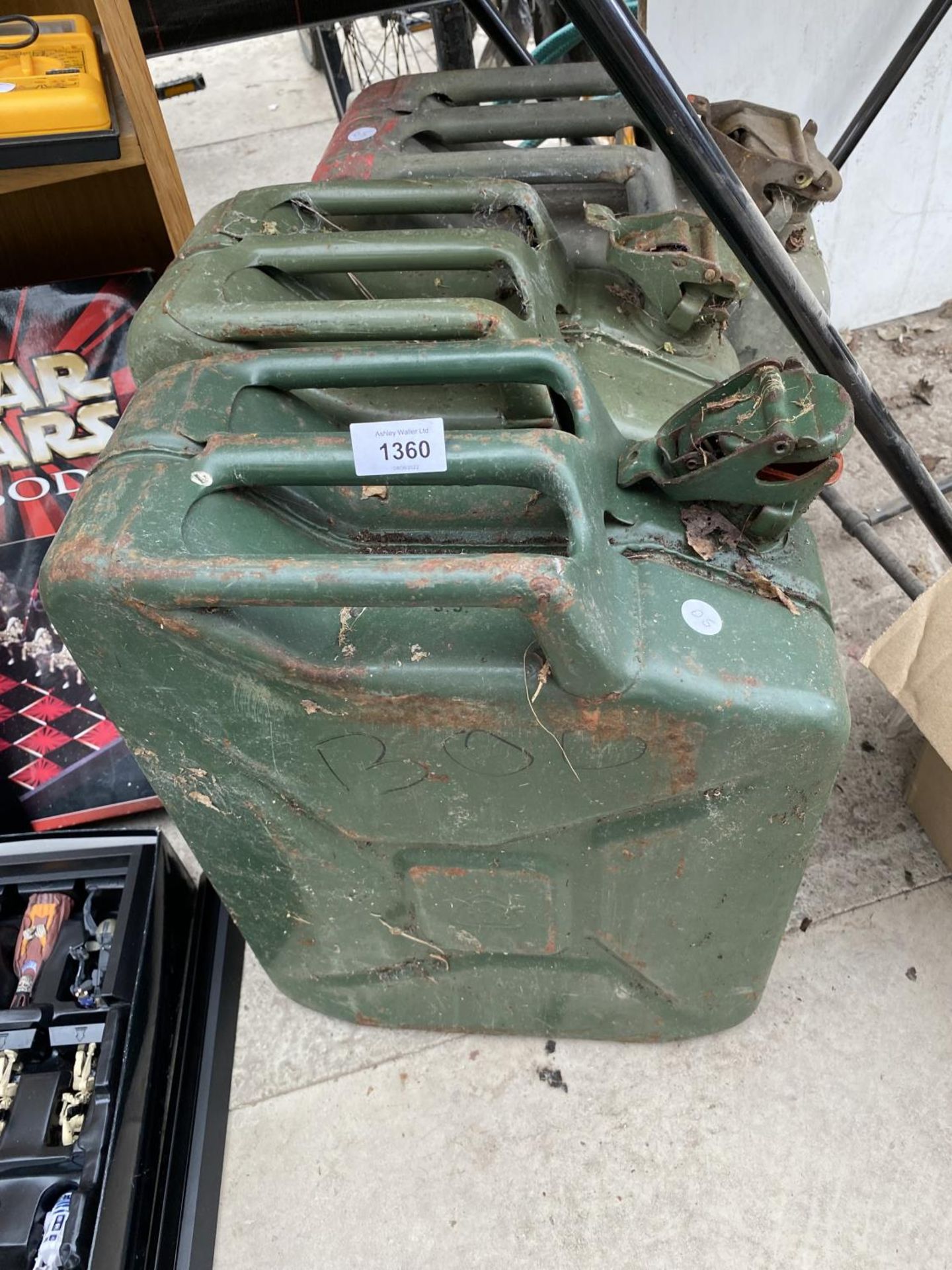 THREE VINTAGE METAL JERRY CANS