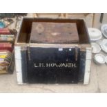 A VINTAGE WOODEN STORAGE CHEST AND A SMALL METAL TRUNK