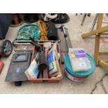 AN ASSORTMENT OF ITEMS TO INCLUDE A WELDING MASK, A TILE CUTTER AND ROPE ETC