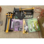 AN ASSORTMENT OF TOOLS TO INCLUDE TILE CUTTERS, BULBS AND SPARK PLUG ANALYSERS ETC