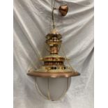 AN UNUSUAL BRASS AND COPPER PENDANT LIGHT WITH DOMED GLASS SHADE, SHIPS WHEEL DESIGN AND CHAINS