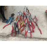 A LARGE ASSORTMENT OF PLIERS AND SNIPS