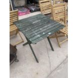 A WOODEN SLATTED SQUARE GARDEN TABLE