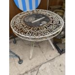 A DECORATIVE WROUGHT IRON BISTRO TABLE WITH RECONSTITUTED STONE CENTRE