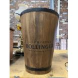 A WOODEN 'BOLLINGER CHAMPAGNE BUCKET WITH METAL BANDING AND HANDLE HEIGHT 40CM