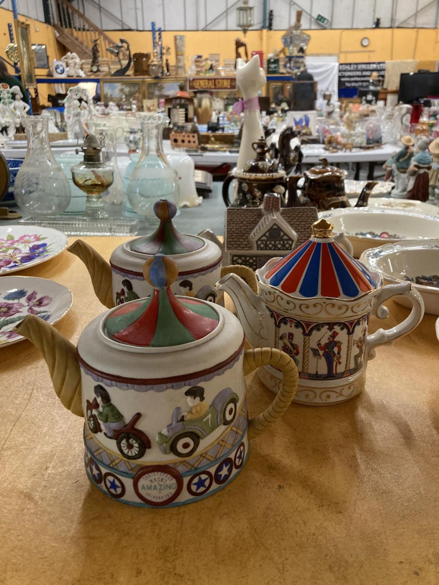 TWO CHRISTOPHER WREN 'CIRCUS' TEAPOTS PLUS TWO SADLER TEAPOTS