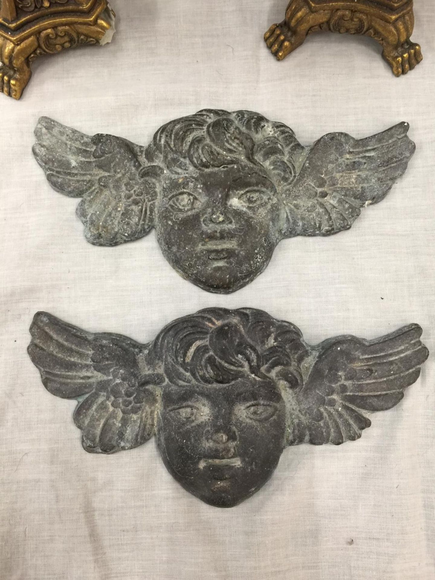 A PAIR OF DECORATIVE CANDLE STICK HOLDERS WITH CHERUB DESIGN (ONE A/F) AND TWO HEAVY CHERUB LEAD - Image 2 of 8