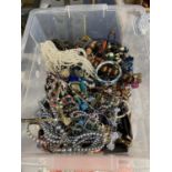 A BOX CONTAINING A QUANTITY OF COSTUME JEWELLERY TO INCLUDE BANGLES, NECKLACES, BRACELETS, ETC