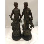 TWO METAL STATUETTES OF FARMERS HEIGHT APPROX 40CM