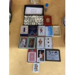 A QUANTITY OF PLAYING CARDS, DOMINOES, JACKS, ETC