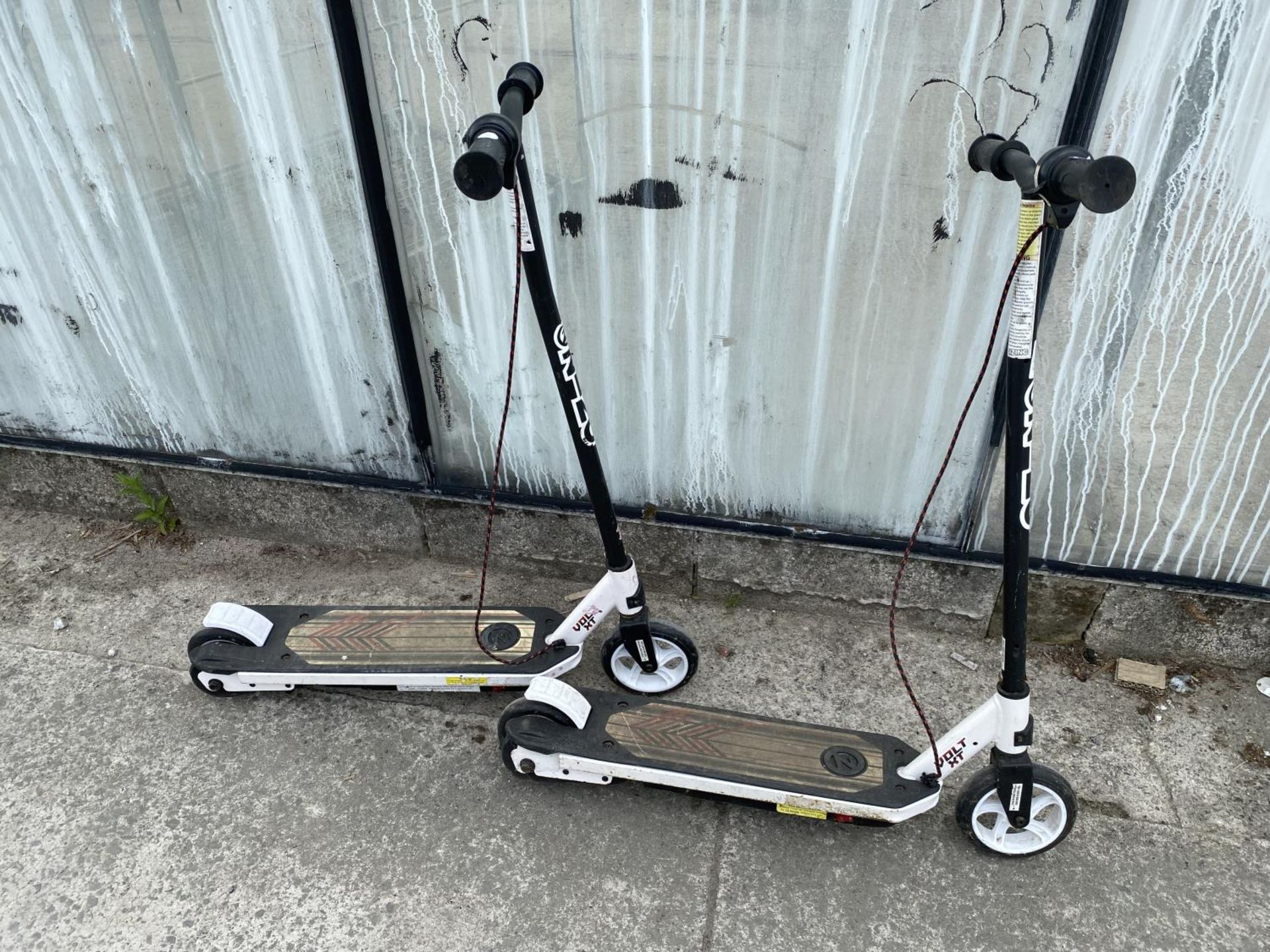 TWO CHILDRENS ZINC SCOOTERS