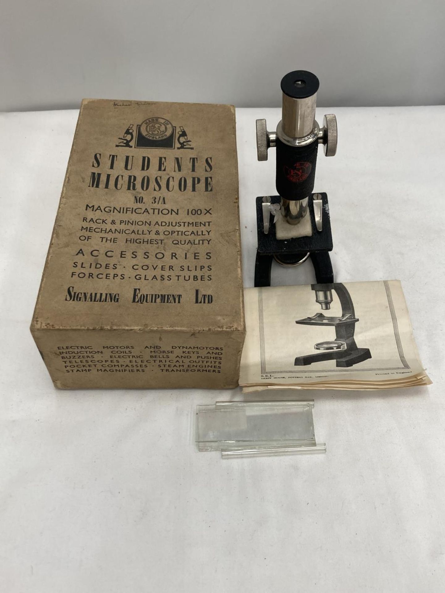 A BOXED STUDENTS MICROSCOPE MADE BY SIGNALLING EQUIPMENT LIMITED - Image 2 of 3