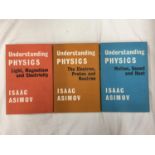 A FIRST EDITION UNDERSTANDING PHYSICS IN THREE VOLUMES BY ISAAC ASIMOV WITH DUST COVERS