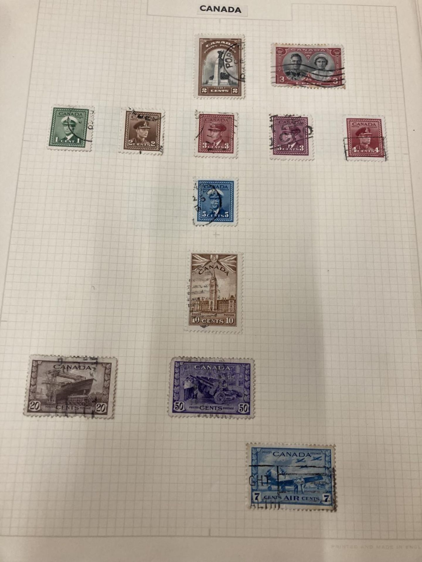 A COLLECTION OF BRITISH COMMONWEALTH STAMPS IN TWO VOLUMES FROM CANADA TO ZANZIBAR