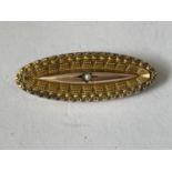 A 9CT GOLD VICTORIAN BROOCH WITH A CENTRE SEED PEARL WITH PRESENTATION BOX