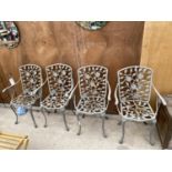 A SET OF FOUR CAST ALLOY BISTRO CHAIRS WITH FLORAL PATTERN