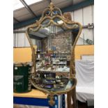 A LARGE 19TH CENTURY STYLE GILT WALL MIRROR DECORATED WITH SWAGS AND FRUIT H: 100CM