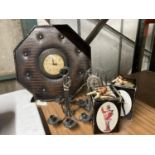 AN OCTAGONAL SHAPED CLOCK FRAMED WITH STUDDED FAUX LEATHER, A PAIR OF WALL MOUNTED METAL