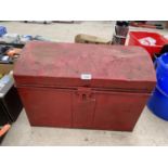A SMALL VINTAGE METAL STORAGE TRUNK