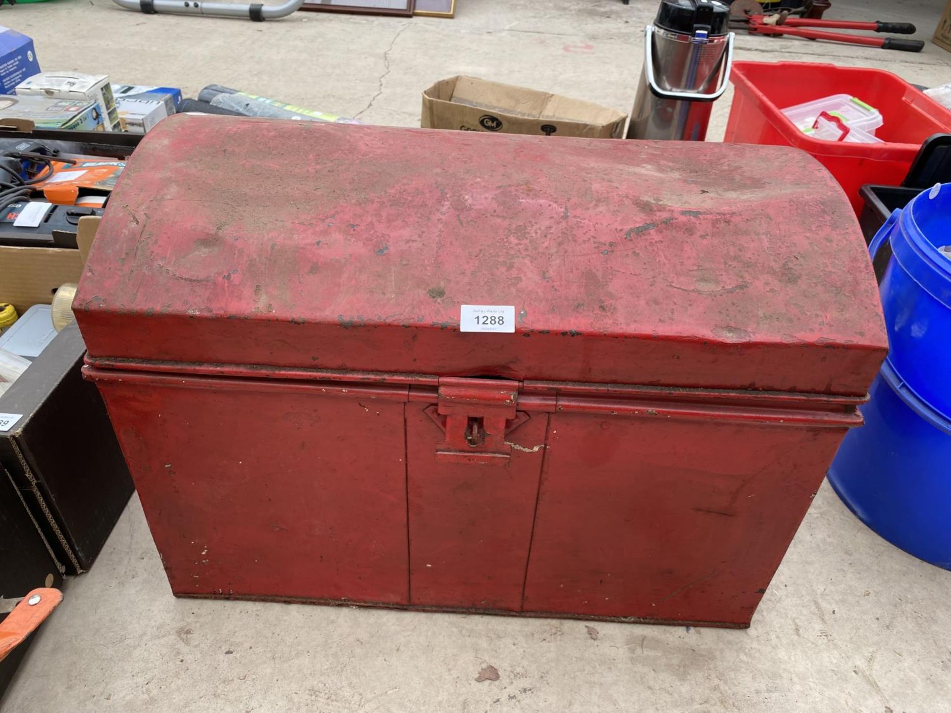 A SMALL VINTAGE METAL STORAGE TRUNK