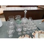 AN ASSORTMENT OF GLASS WARE TO INCLUDE SHERRY GLASSES AND A DECANTOR ETC