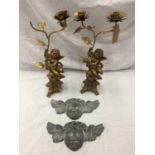 A PAIR OF DECORATIVE CANDLE STICK HOLDERS WITH CHERUB DESIGN (ONE A/F) AND TWO HEAVY CHERUB LEAD