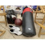 AN ASSORTMENT OF SPORTS EQUIPMENT TO INCLUDE A PUNCH BAG AND A BOWLING BALL ETC