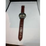 A DANIEL HECHTER WRISTWATCH SEEN WORKING BUT NO WARRANTY