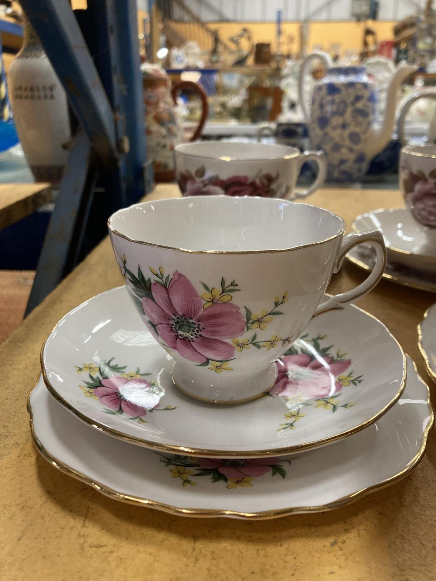 A QUANTITY OF BONE CHINA 'ROSE' PATTERNED TRIOS PLUS A COALPORT 'JUNETIME' CUP AND SAUCER AND A - Image 8 of 8