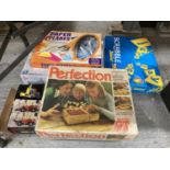 A QUANTITY OF VINTAGE BOXED GAMES TO INCLUDE JUNIOR SCRABBLE, PAPER PLANES, LEGO, A JIGSAW PUZZLE,