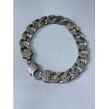 A HEAVY MARKED SILVER FLAT LINK BRACELET