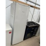 A WHITE HOTPOINT UPRIGHT FRIDGE