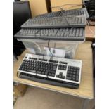 AN ASSORTMENT OF COMPUTER ACCESSORIES TO INCLUDE KEYBOARDS AND MICE ETC