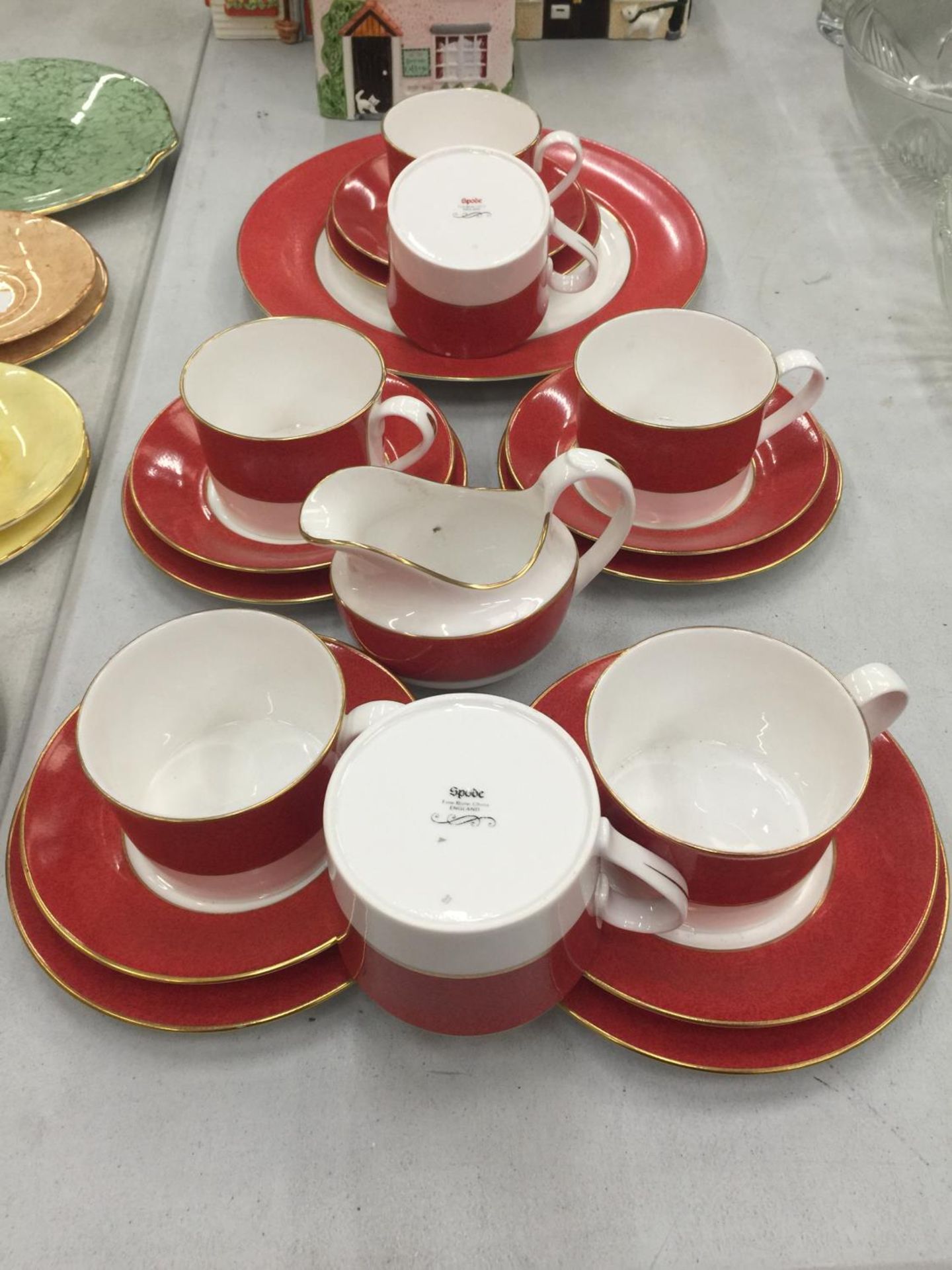 A QUANTITY OF SPODE ORANGE AND WHITE CUPS, SAUCERS, PLATES, ETC