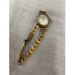 A VINTAGE LADIES 9 CARAT GOLD CASED AVIA 17 JEWEL INCABLOK WRISTWATCH WITH A 12 CARAT ROLLED GOLD