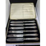 A BOXED SET OF SIX BUTTER KNIVES WITH HALLMARKED SHEFFIELD 1929 HANDLES JAMES DEAKIN AND SONS LTD