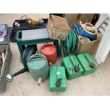 AN ASSORTMENT OF GARDEN ITEMS TO INCLUDE FUEL CANS, A HOSE PIPE AND ROPE ETC