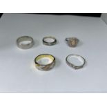 FIVE MARKED SILVER RINGS OF VARIOUS DESIGN\