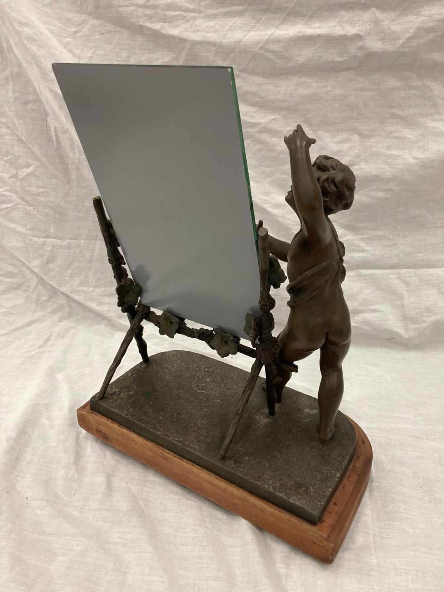 A VINTAGE FRENCH BRONZED FIGURE OF A BOY AND A TRELLIS OF FLOWERS SUPPORTING A MIRROR (MIRROR NOT - Image 4 of 5