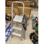 A TWO RUNG ALUMINIUM STEP LADDER AND A TWO RUNG STEP STOOL