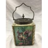 A BISCUIT BARREL WITH FAIRIES AND FLOWERS DESIGN TO PANELS AND A PEWTER LID AND HANDLE WITH CARLTONS