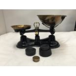A SET OF BLACK AND BRASS SALTER No 56 SALTER SCALES AND WEIGHTS