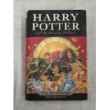 A FIRST EDITION HARDBACK HARRY POTTER AND THE DEATHLY HALLOWS BY J.K. ROWLING PUBLISHED 2007