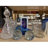 A QUANTITY OF GLASSWARE TO INCLUDE PAPERWEIGHTS, DECANTER, ICE BUCKET,VASES, ETC