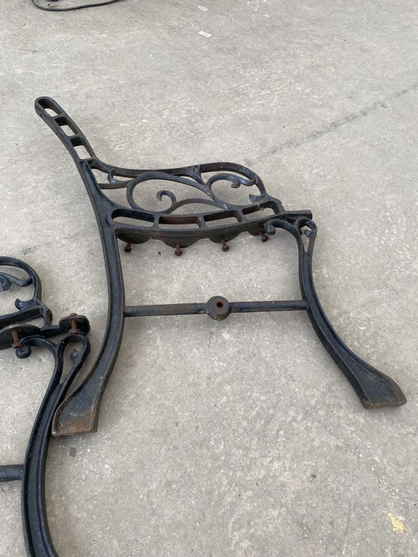 A PAIR OF DECORATIVE CAST IRON BENCH ENDS - Image 3 of 3