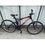 A LADIES COMPASS MOUNTAIN BIKE WITH FRONT AND REAR SUSPENSION AND 21 SPEED SHIMANO GEAR SYSTEM